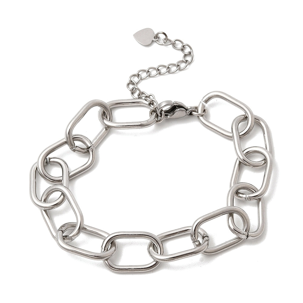 silver tone large oval cable link chain bracelet with lobster claw clasp and extender chain with heart charm end over white background.