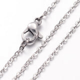 zoomed in sections of silver tone flat cable chain necklace with lobster claw clasp over white background. 