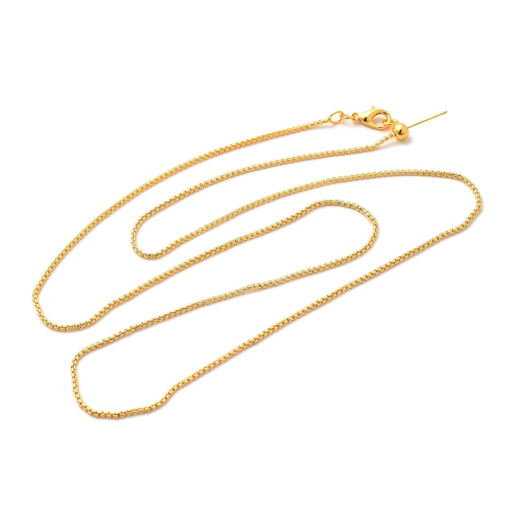 golden box chain adjustable slider necklace with lobster claw clasp, slider bead and stopper over white background. 