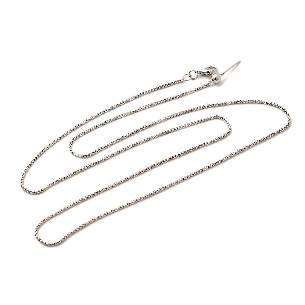 silver tone box chain adjustable slider necklace with lobster claw clasp, slider bead and stopper over white background. 