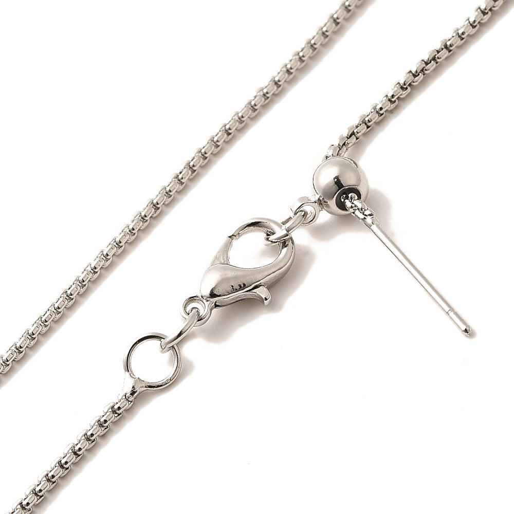 zoomed in sections of silver tone box chain adjustable slider necklace with lobster claw clasp, slider bead and stopper over white background. 