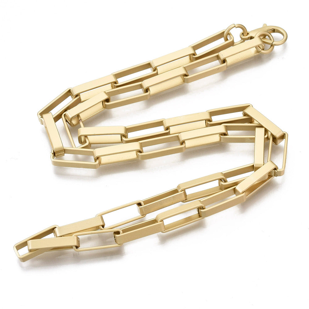 matte finished, golden large square paperclip link necklace with lobster claw clasp on white background. 