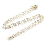 light golden small paperclip link necklace with lobster claw clasp on white background. 