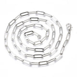 silver tone large paperclip link chain with lobster claw clasp in swirl pattern over white background. 