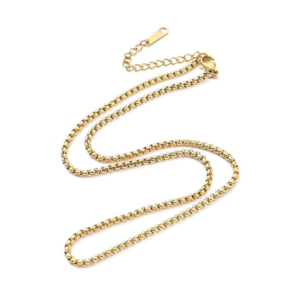 golden Venetian box chain necklace with lobster claw clasp and extender chain over white background. 