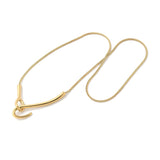 golden snake chain necklace with large hook focal clasp over white background. 