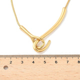 zoomed in golden snake chain necklace with large hook focal clasp displayed above wooden ruler over white background. 