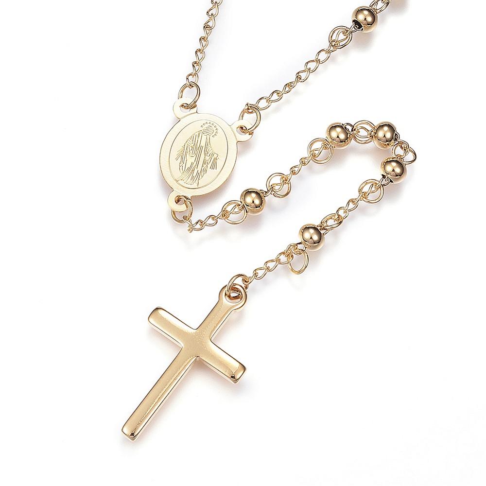 golden beaded Rosary with front of miraculous medal and cross pendant over white background. 
