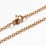 zoomed in sections of golden textured cable chain with lobster claw clasp on white background. 
