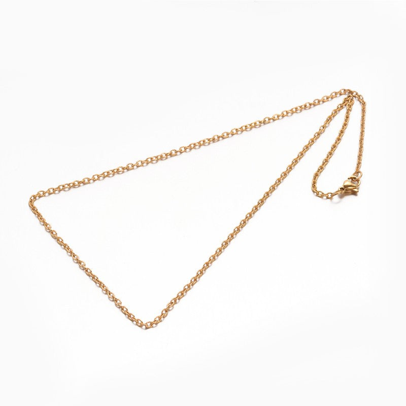 golden textured cable chain with lobster claw clasp on white background. 