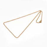 golden textured cable chain with lobster claw clasp on white background. 