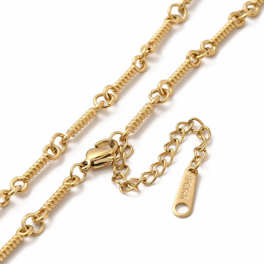 zoomed in sections of golden twisted bar link chain necklace with lobster claw clasp, extender chain over white background. 