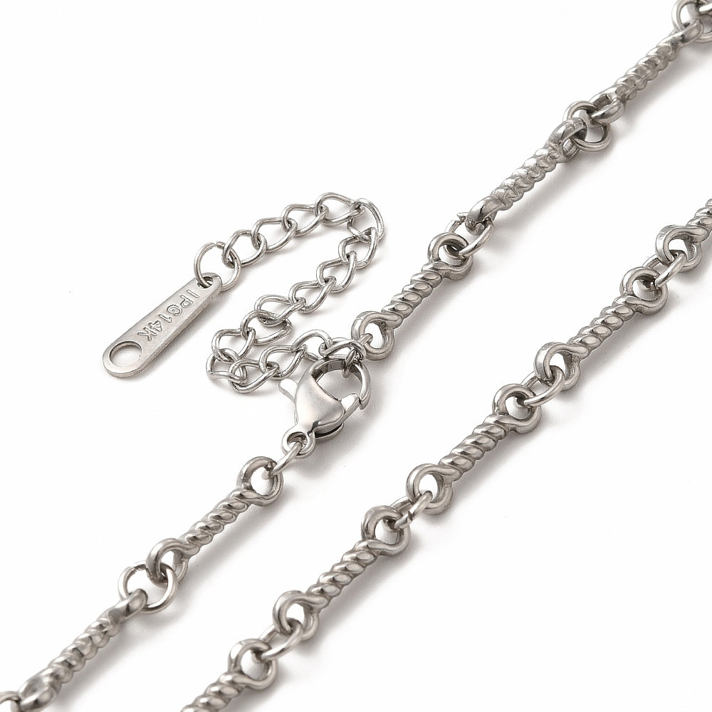 zoomed in sections of silver tone twisted bar link chain necklace with lobster claw clasp, extender chain over white background. 