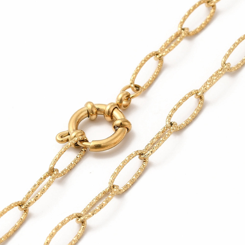 zoomed in section of golden textured oval cable link chain necklace with large spring ring clasp on white background. 