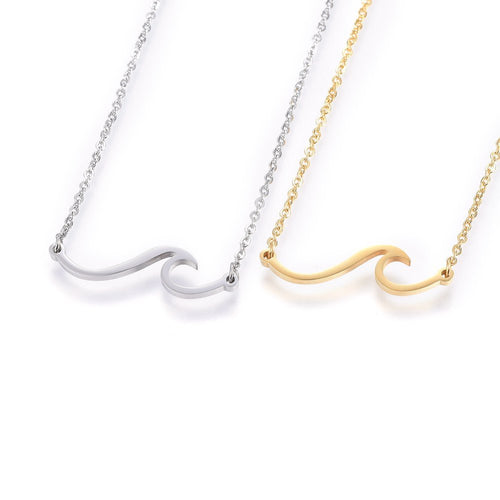 one silver tone and one golden wave pendant necklace on cable chain displayed side by side over a white background. 