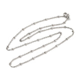 silver tone satellite chain necklace with rondelle beads and lobster claw clasp over white background. 