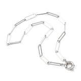 silver tone paperclip chain necklace with large spring ring clasp on white background. 