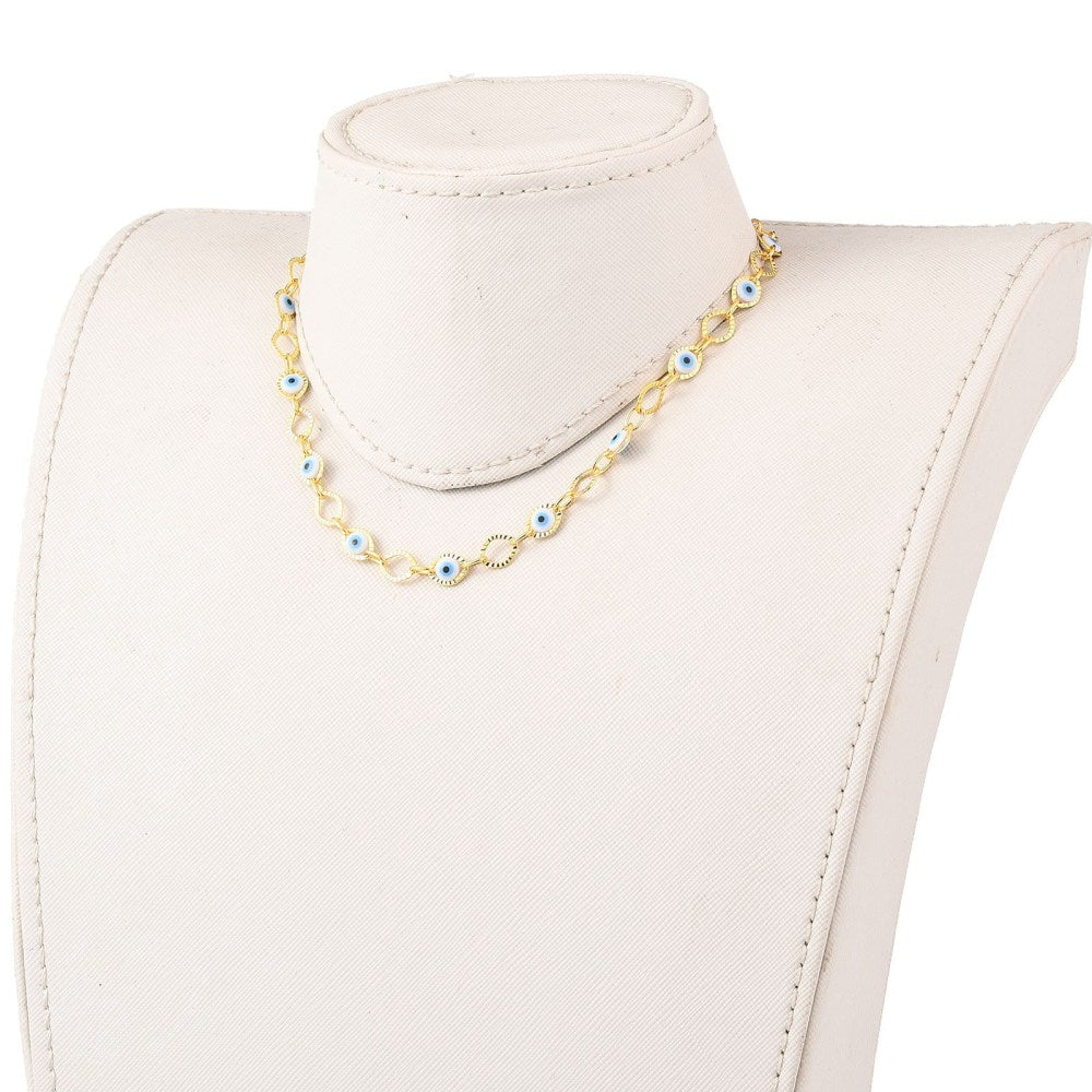 golden horse eye and evil eye link choker necklace displayed on off-white neck form with a white background. 