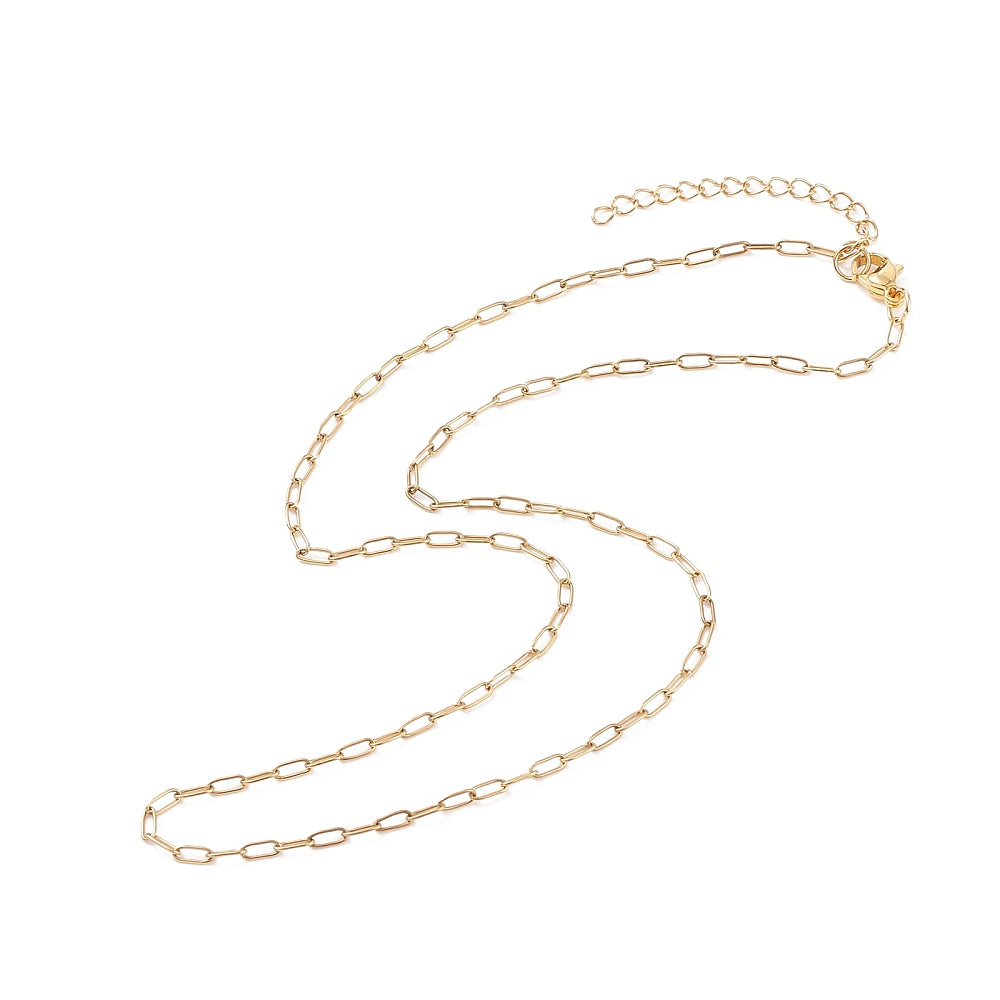 zoomed in sections of small golden paperclip chain with lobster claw clasp and extender chain over white background. 
