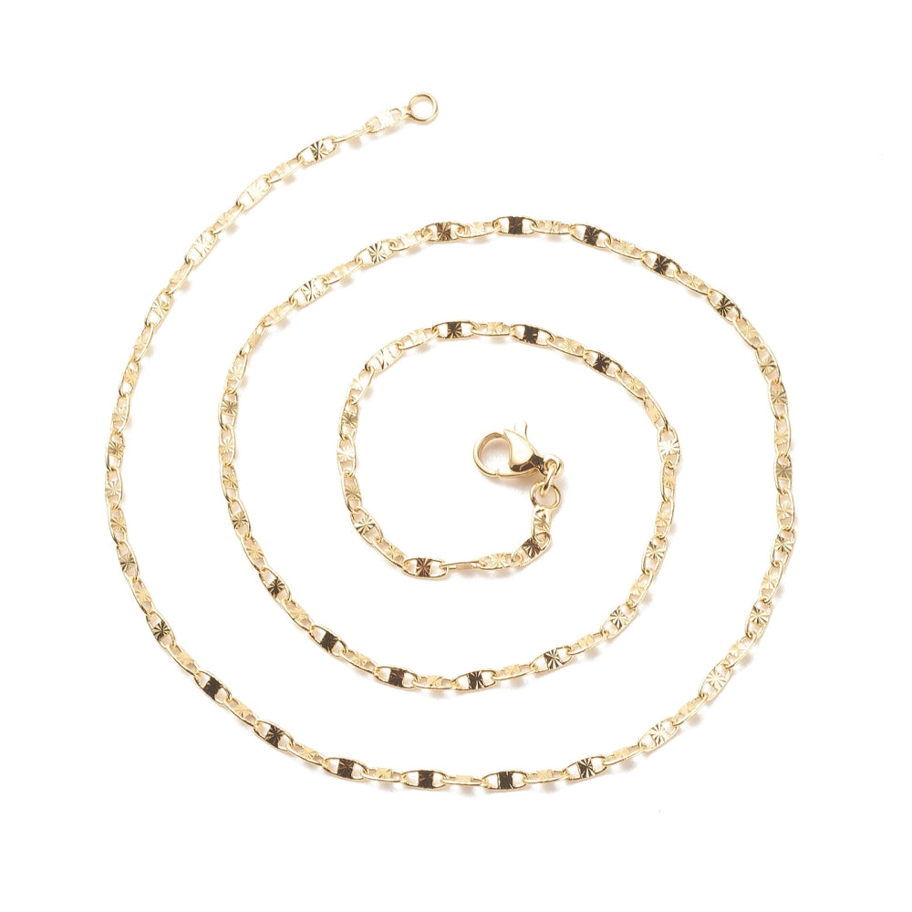 golden sunburst oval link chain necklace with lobster claw clasp in swirl design over white background. 