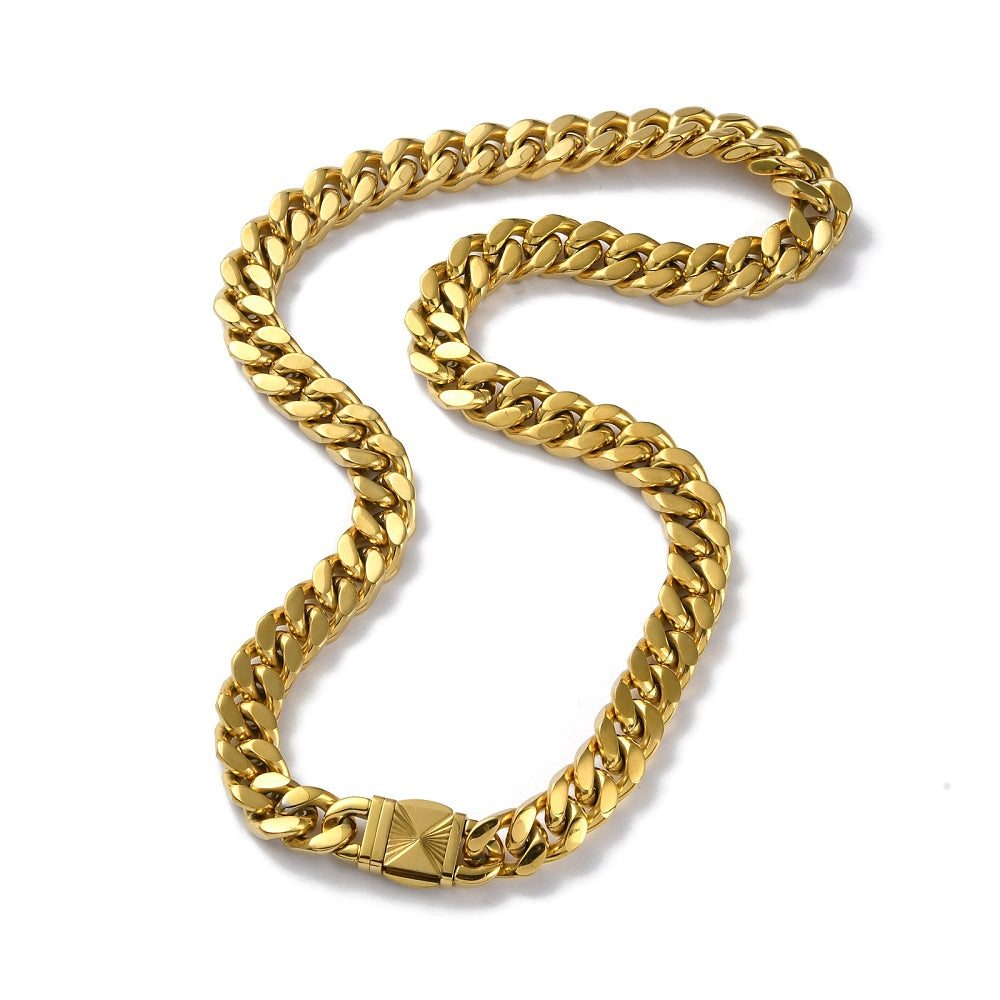 golden extra large curb link necklace with swirl decorative box clasp on white background. 