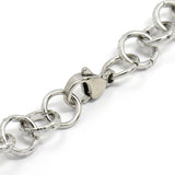 zoomed in sections of silver tone  bubbles cable link bracelet with lobster claw clasp on white background. 
