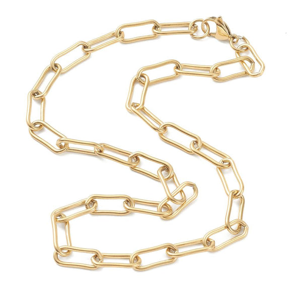 golden large round paperclip chain necklace with large lobster claw clasp in an s shape over white background. 