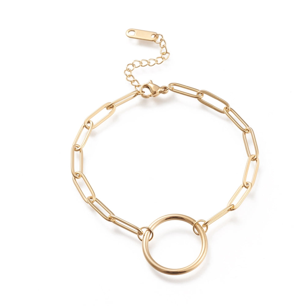 golden paperclip chain bracelet with ring focal lobster claw clasp and extender chain over white background. 