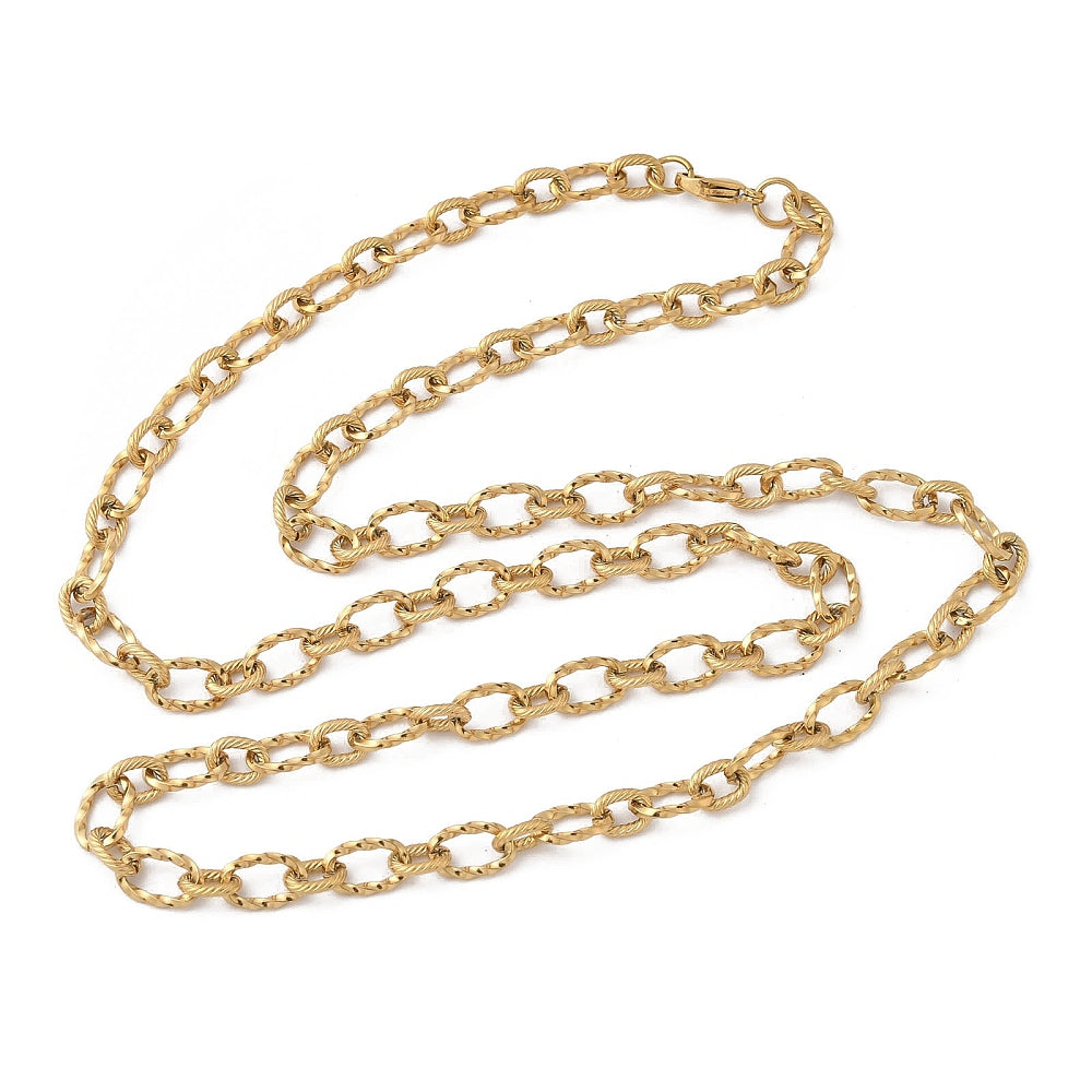 golden textured cable chain with lobster claw clasp on white background. 