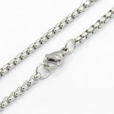 zoomed in sections of silver tone Venetian box chain with lobster claw clasp on white background. 