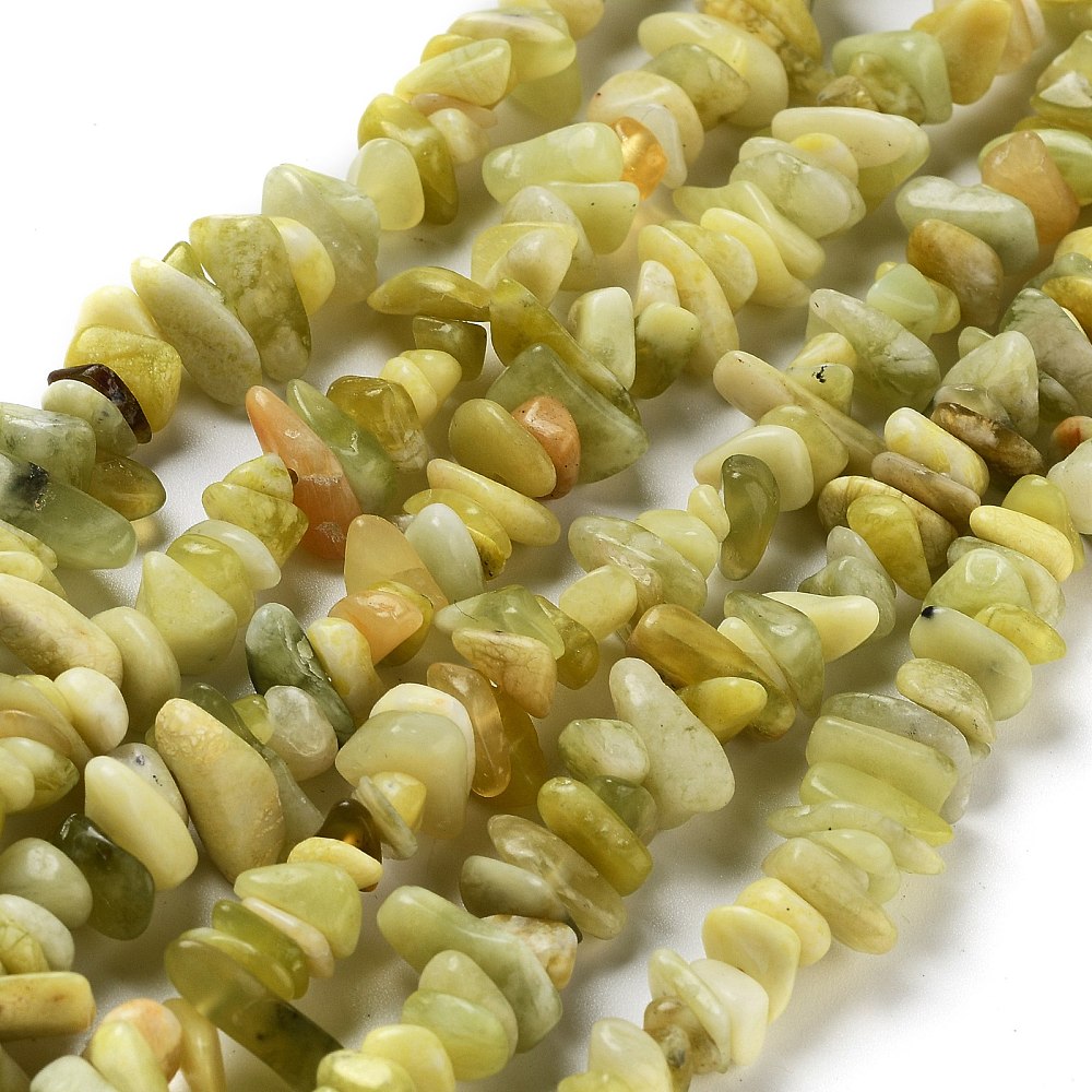 six lemon jade chip bead strands over white surface. 