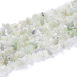 six strands of new jade chip bead strands over white surface. 