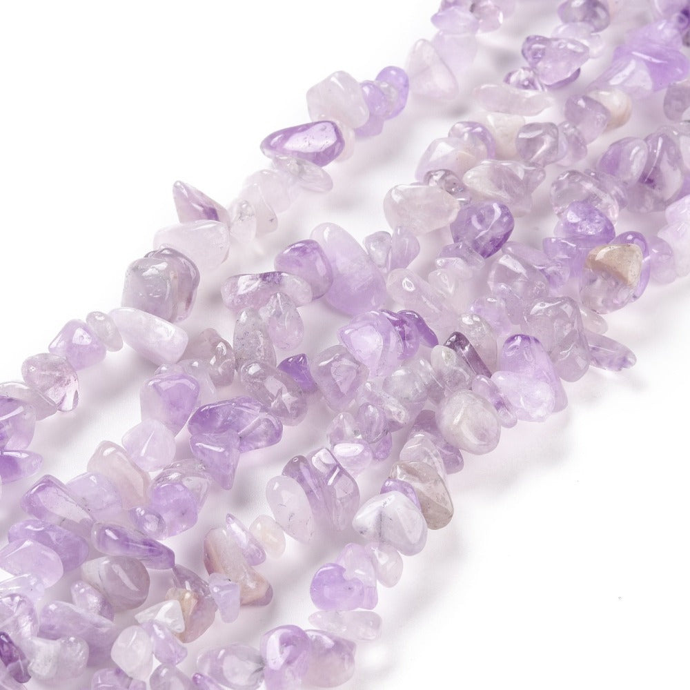 five lavender amethyst chip bead strands over white background. 
