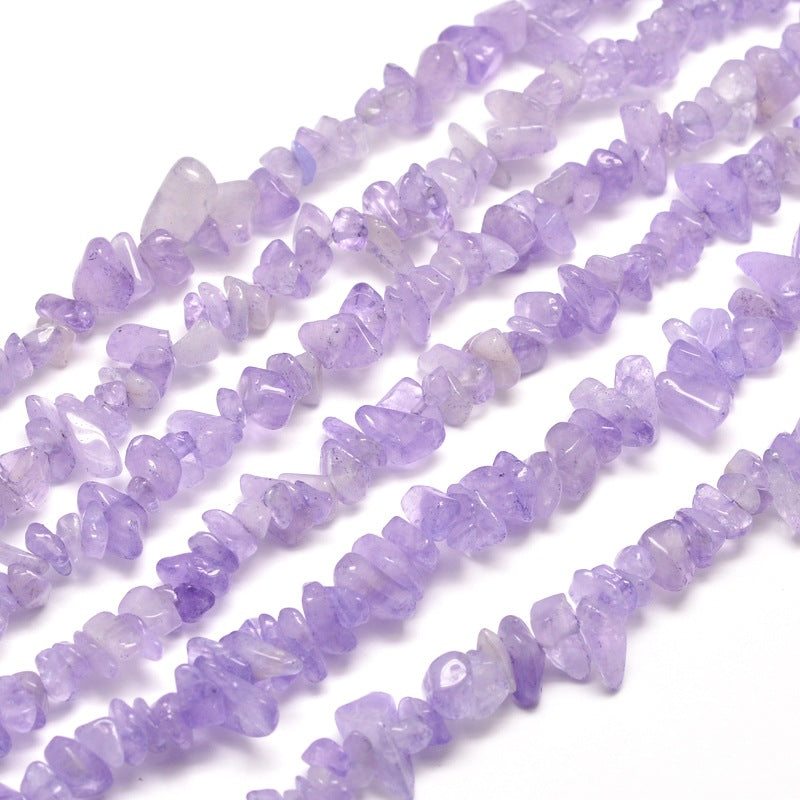 six lavender amethyst chip bead strands over white background. 