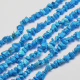 six dyed light sky blue synthetic turquoise chip bead strands over white surface. 