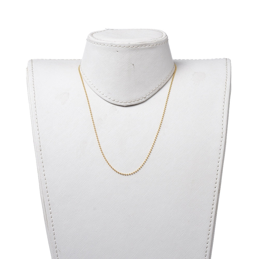 golden ball chain necklace on white neck form with white background. 