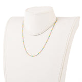 golden multi-color enamel twisted chain necklace on off white neck form with white background. 