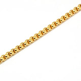 zoomed in section of golden heavy Venetian box chain necklace over white background. 