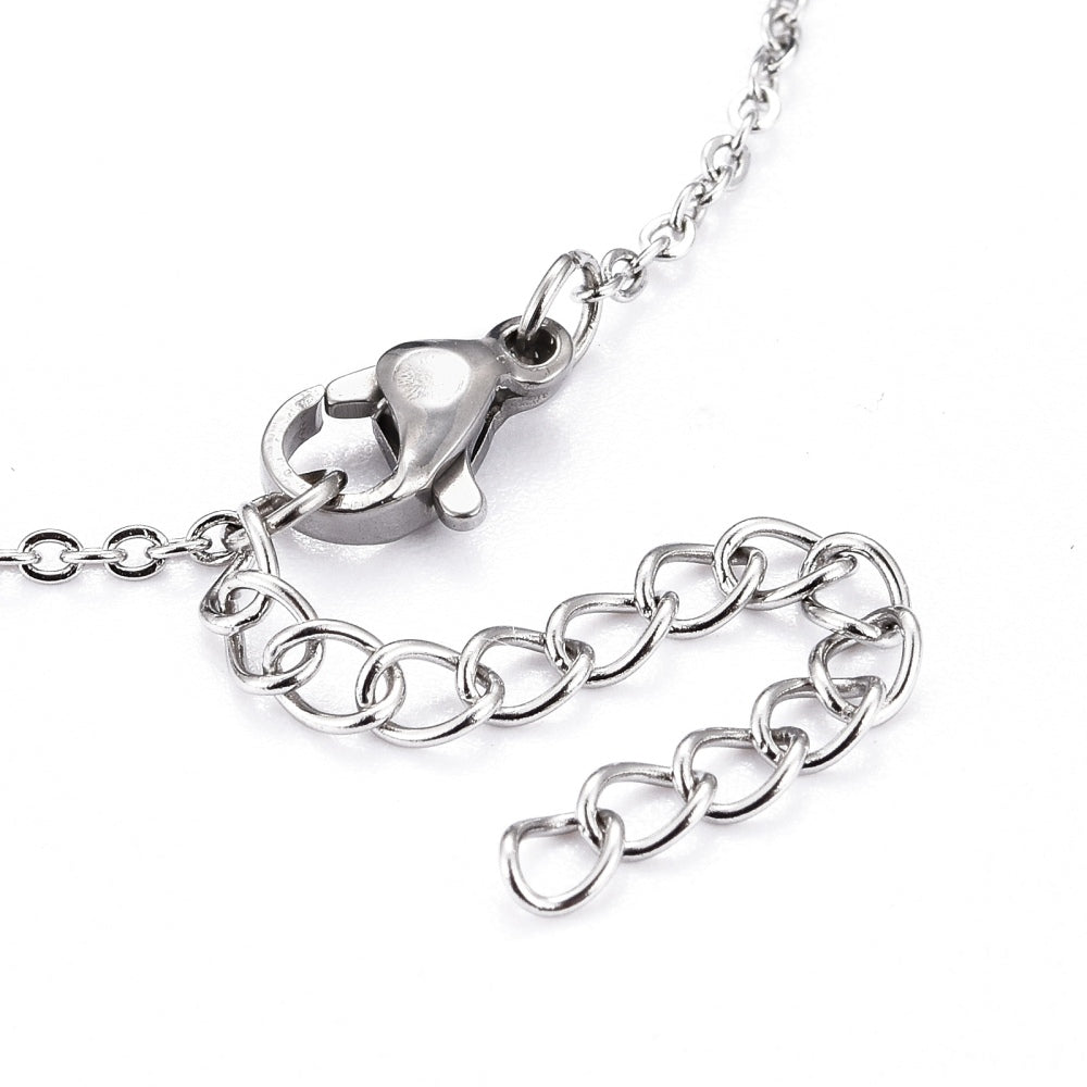 stainless steel lobster claw clasp and extender on cable chain on white background. 