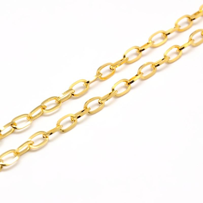 zoomed in sections of golden oval cable link necklace on white background. 