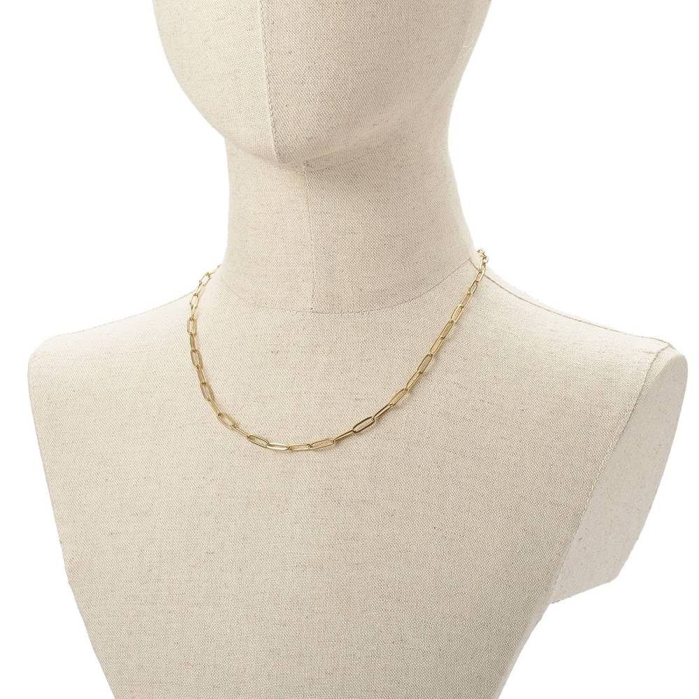 golden medium link paperclip chain necklace on burlap neck form with white background. 