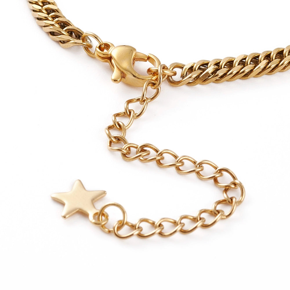golden diamond cut curb chain bracelet with a lobster claw clasp and an extender with a star charm on the end shown on a white background. 