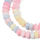 zoomed in sections of multicolor pastel smooth rondelle jade bead strands over white background.  