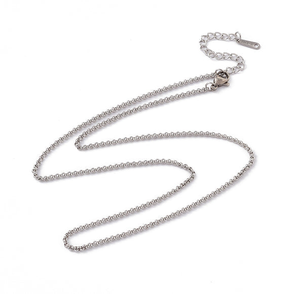 stainless steel Rolo chain with lobster claw clasp and extender chain on white background. 