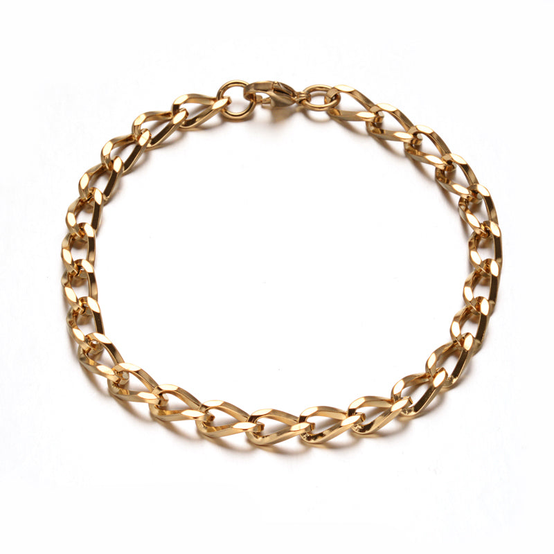 golden twisted chain bracelet with lobster claw clasp over white background. 