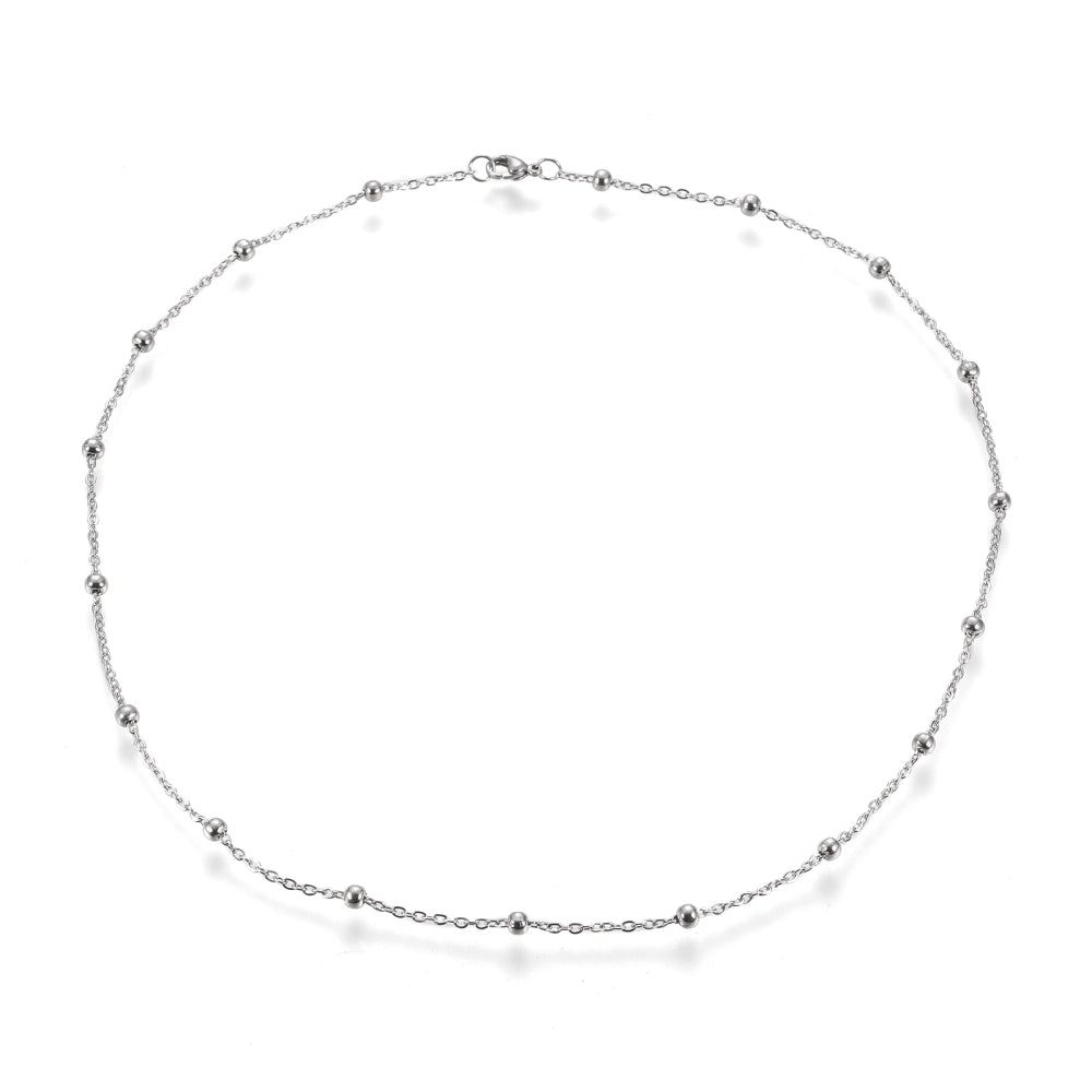 stainless steel large bead satellite chain necklace with lobster claw clasp on white background. 