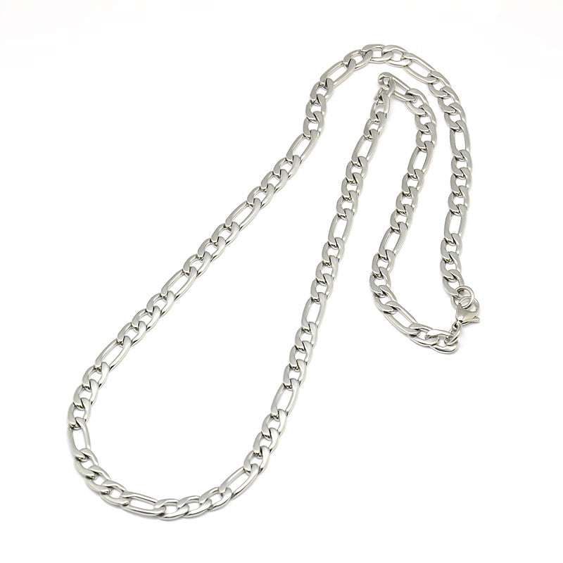 silver tone Figaro chain necklace with lobster claw clasp on a white background. 