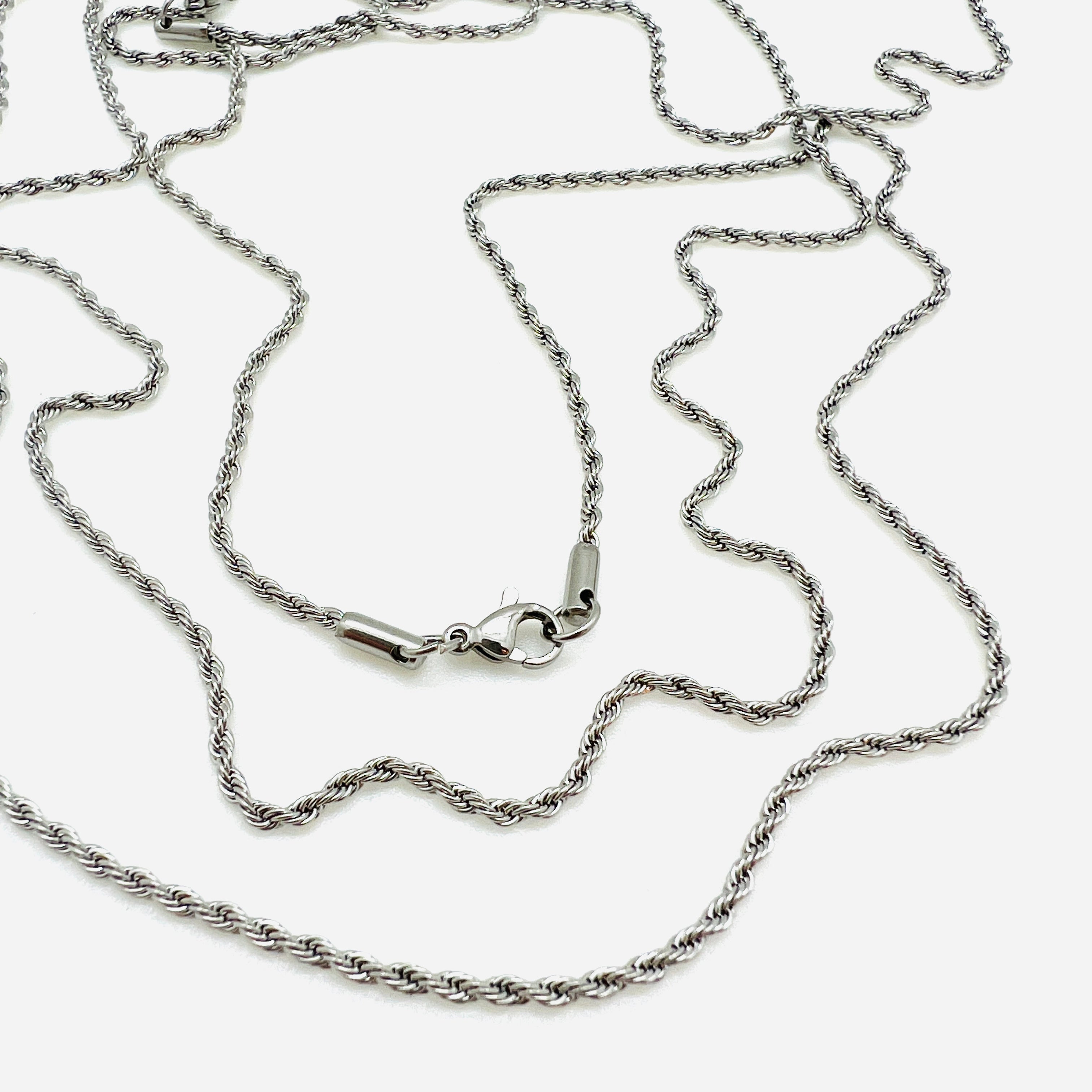 stainless steel rope chain with lobster claw clasp on white background. 
