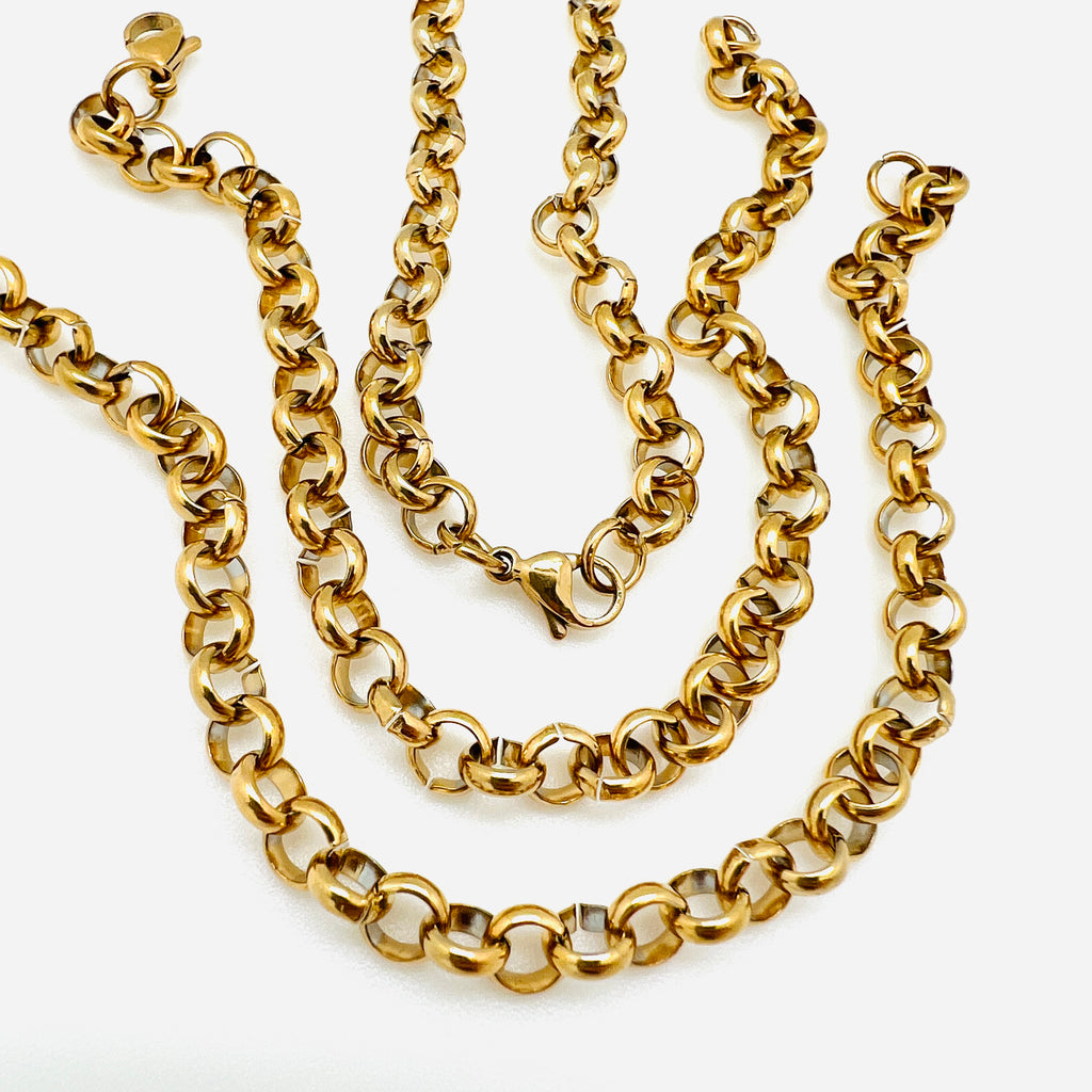 three golden rolo chain bracelets with lobster claw clasps over white background. 