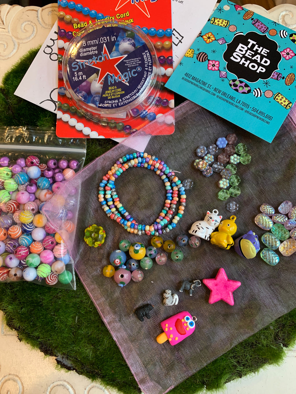 Bead kit full of jewelry making supplies perfect to make beaded bracelets. Kit includes glass beads, seed beads, heishi beads and charms